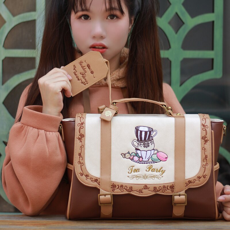 Mochila japonesa lolita para mujer, bolsa pequeña dulce con bordado de reducción de edad, bolso escolar A4 de hombro de 3 vías
