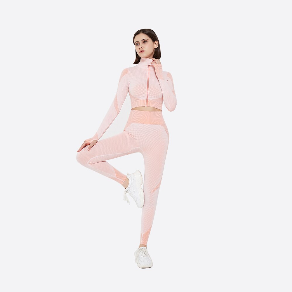 Avskuren långärmad träningstopp och leggings med hög midja i rosa
