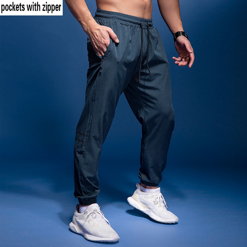 Bintuoshi menn sport løpebukser fotball treningsbukser med glidelåslommer jogge Fitness treningsstudio bukser trening sport bukser 2: Grønn / L (165-170cm)