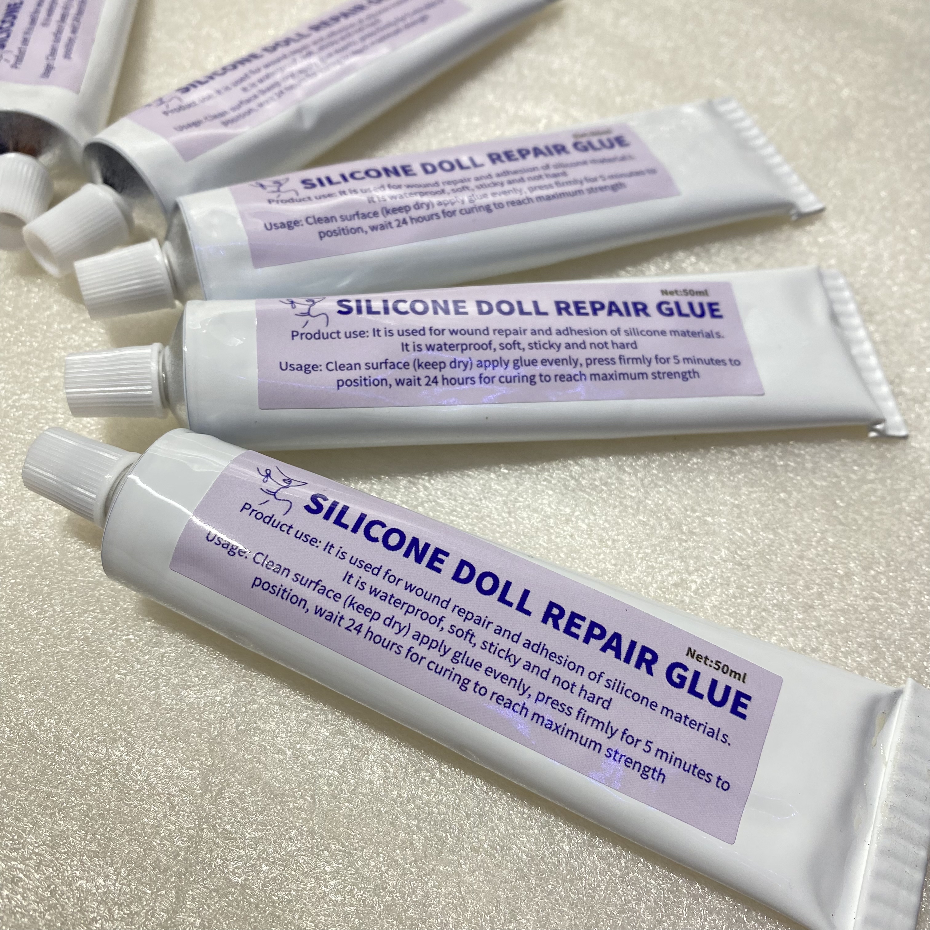 Platin silikone dukke reparationslim, silikone materiale speciallim, soldat kropslim, kan udfylde bindingssprækker, blød , 50ml