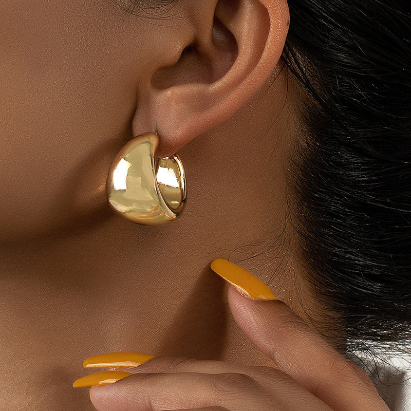 Pendiente de aro con giros circulares para mujer, temperamento Simple, hipérbole, Color dorado, uso diario, joyería, de: Rodio plateado