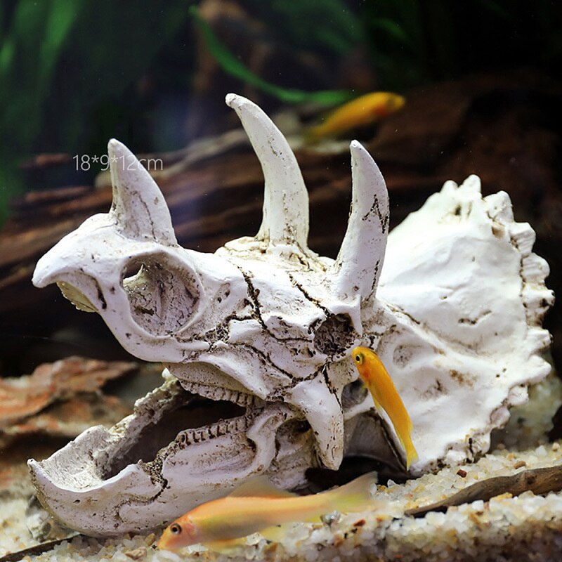 dinosaur fish tank accessories Penn Plax Jurassic Park Velociraptor Aquarium Ornament Most small fish can swim through and around it Fish Tank Aquarium Ornament Feature