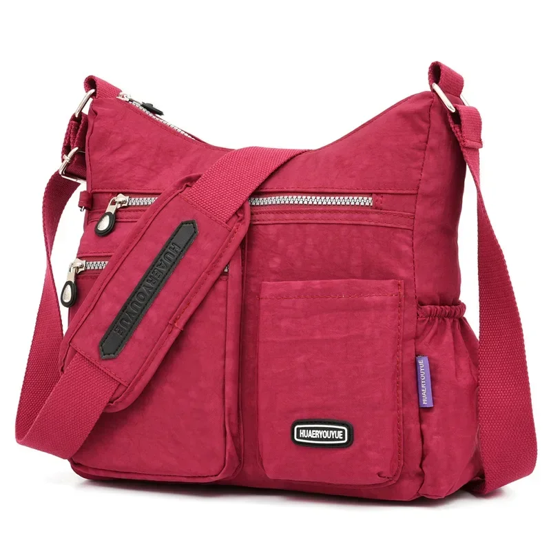 Outdoor crossbodytassen voor dames met antidiefstalvak, lichtgewicht, waterbestendige portemonnees en handtassen.: Rood
