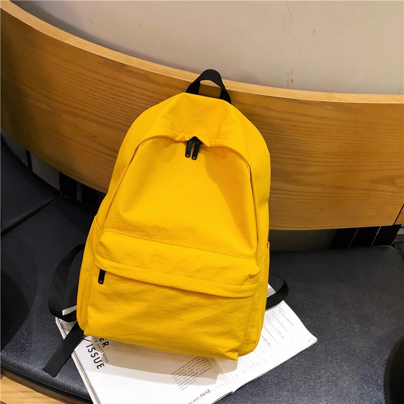 HOCODO Solid Canvas Backpack For Teenagers Women Casual Large Capacity School Bag Simple College Wind Travel Backpack Mochila: Yellow