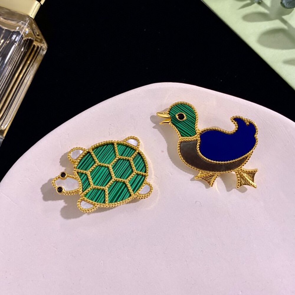 Markenschmuck, retro-brosche im ägyptischen pharao-tier-party-stil, niedliche kleine tierbrosche in gold