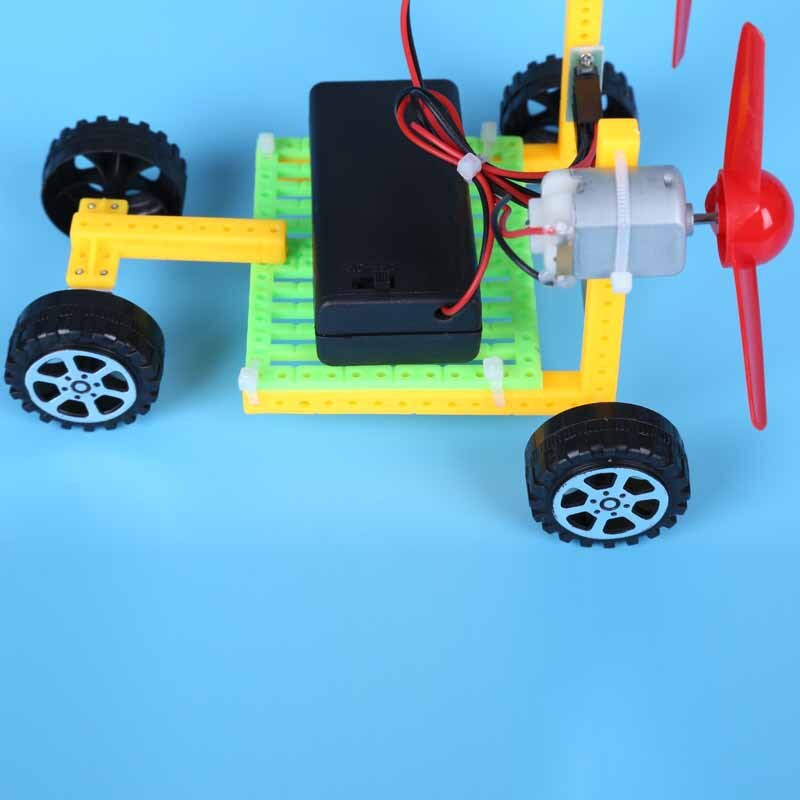 Kinderen DIY wetenschap en technologie kleine productie elektrische wind auto basisschool studenten handmatige bediening Wetenschap Expe