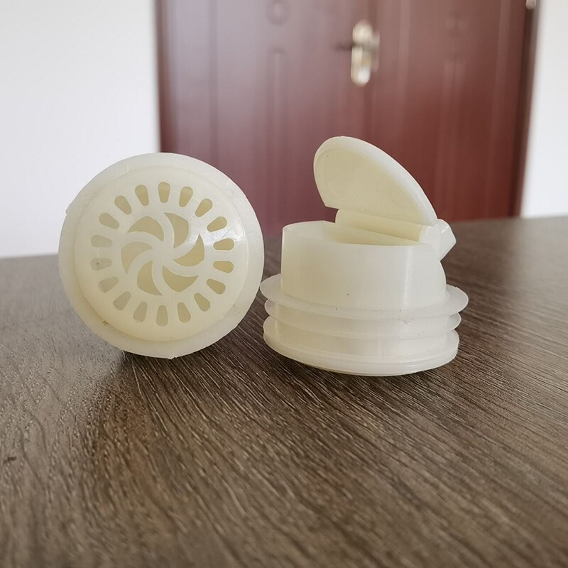 1 stk hvit luktbeskyttende luktbestandig gulv deodorant kjerne kloakk avløpshette vannplugg felle filter kjøkken dårlig tilbehør