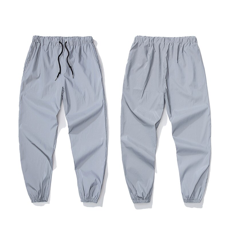 Streetwear de hombres pantalones reflectantes de los nuevos hombres de la calle cordón pantalones de Hip Hop Harem pantalones bailarina