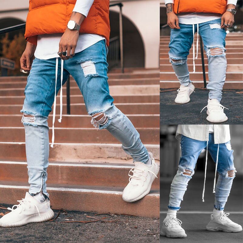 Jean homme Collection de jean zippé est à la avec un dégradé de jean déchiré