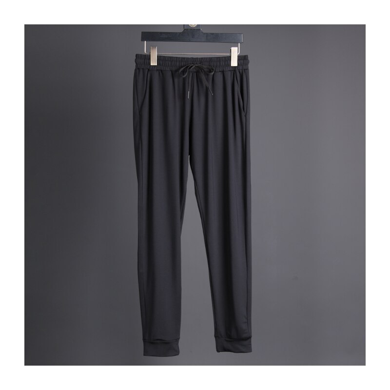 Pantalons longs en cours d'exécution hommes Polyester mince Sport entraînement Joggers poches solides pantalons de survêtement Compression hommes pantalons décontractés