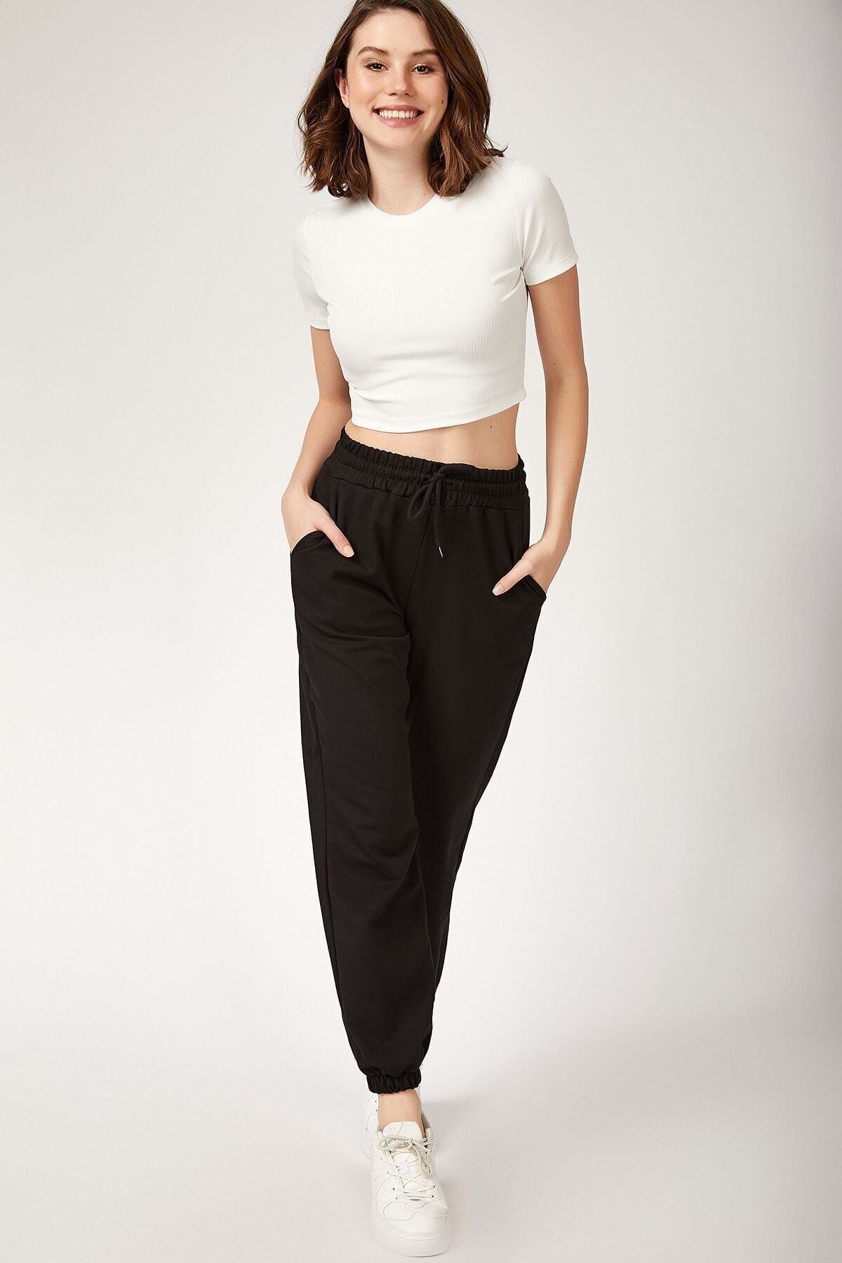 Pantalon de survêtement poche noir femme