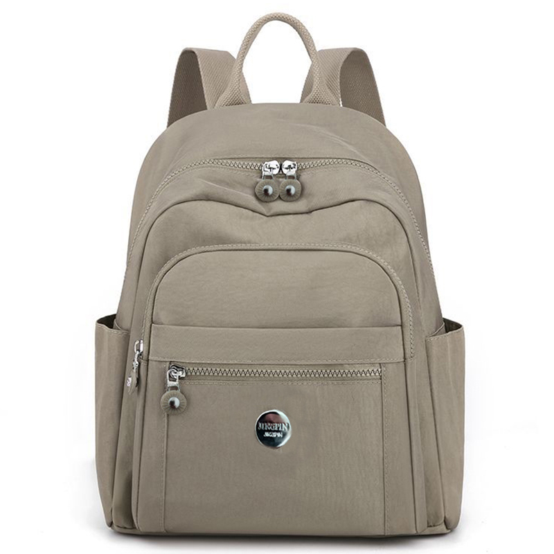 Reisrugzakken voor heren en dames zijn ontworpen voor reizen en schoolgebruik. Ze hebben een eenvoudig .: Beige