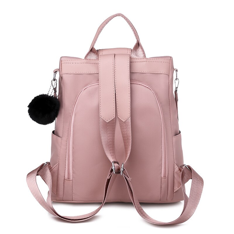 Mochila antirrobo para niñas, bolso escolar Oxford, color morado, colgante rosa, impermeable, de viaje