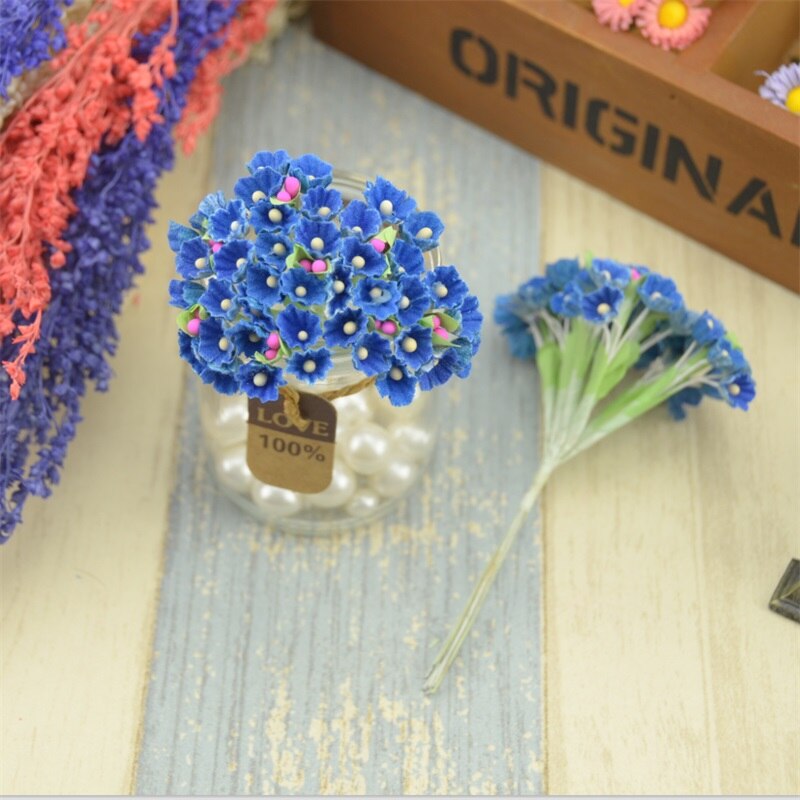 Papieren bloemen als bruiloft decoratie - DIY