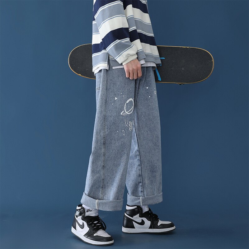 Pantalones vaqueros con Graffiti hombre recto skateboard chic suelto sal serie versátil ancho de la pierna de papá de venta al por menor ropa informal estilo hip hop
