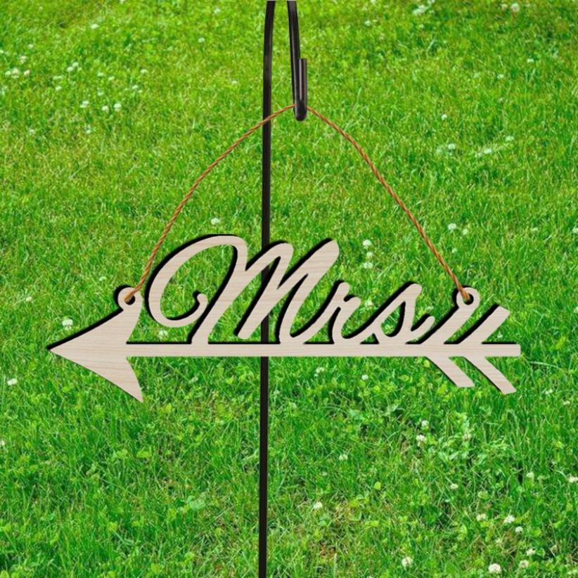 home decor wedding sign in wooden wedding letters and arrow signs indicating wedding party signage for clients