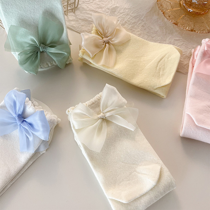 Calcetines de princesa con lazo para mujer, medias de tubo medio de Color sólido para primavera y verano, bonitos calcetines de tubo decorados con lazos,