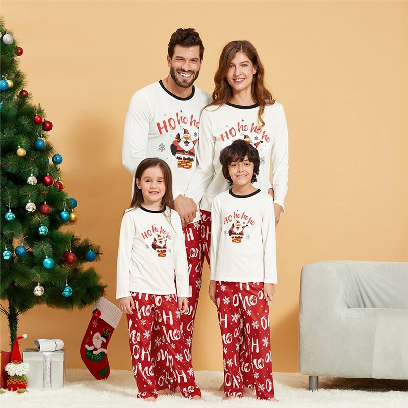 Familie bijpassende kerst pyjama sets vader moeder kind cartoon kerstman bedrukt nachtkleding homewear voor kerstfeest