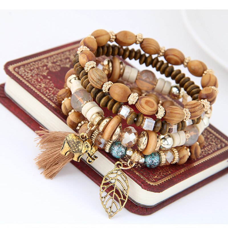 Europese en amerikaanse retro sieraden etnische log kralen kwast baby olifant blad stretch armband set vrouwelijke armband voor vrouwen