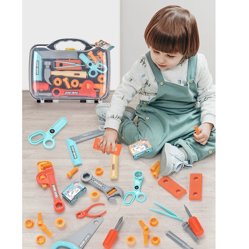 Børns legetøjssimuleringsværktøjskasse foregiver at lege legetøjsreparationsværktøjskasse til børn