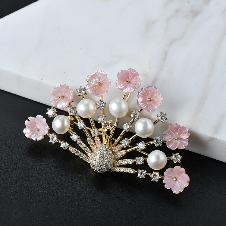 Leichte luxus-schmuckstücke aus österreichischem kristall, perlenbroschen, bekleidungsaccessoires, temperamentvolle pfauen-hochzeitsbroschen