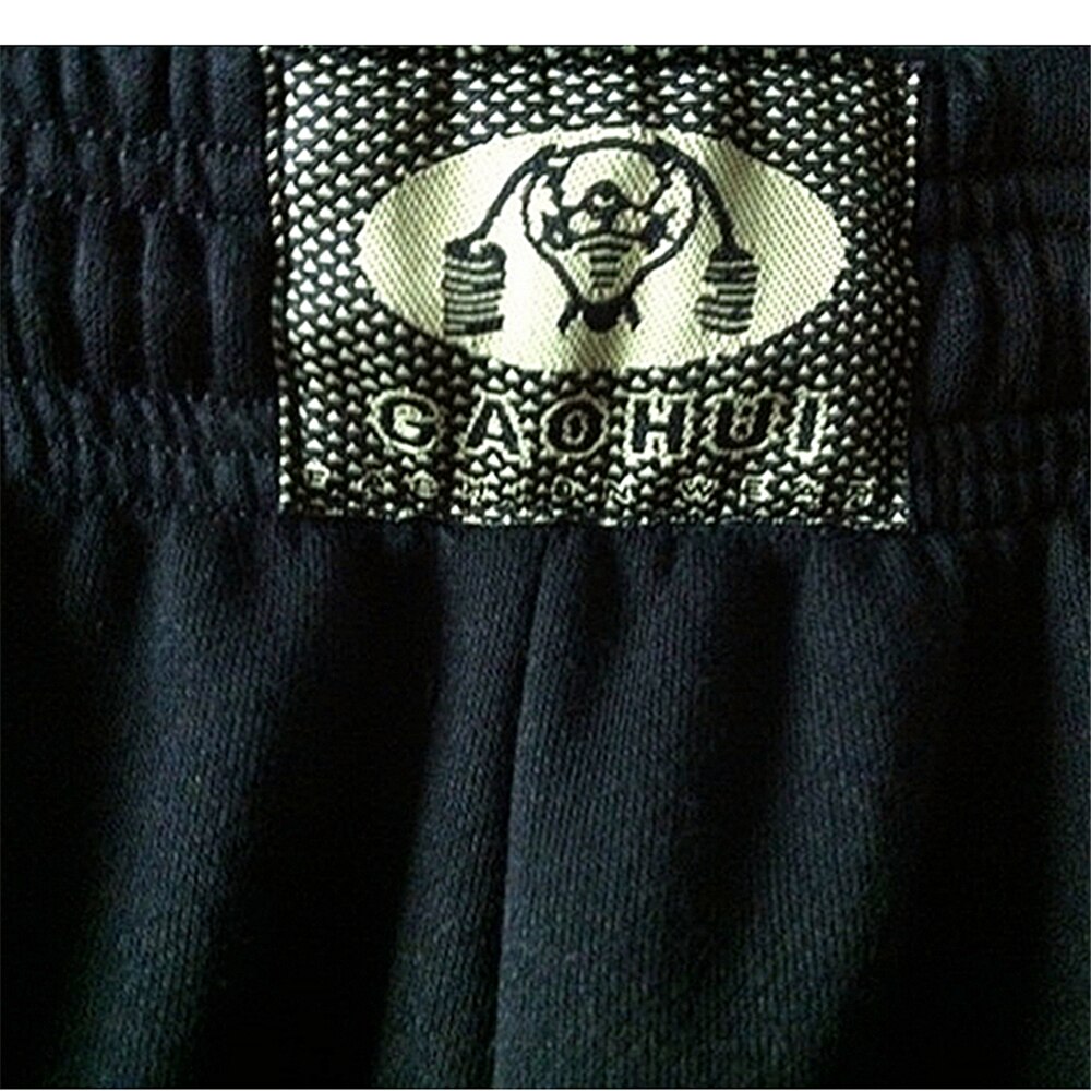 Zimowy trening zdatność spodnie kulturystyka bawełniana koszulka na siłownię odzież na trening sportowy ciepłe spodnie dresowe Crossfit luźne spodnie