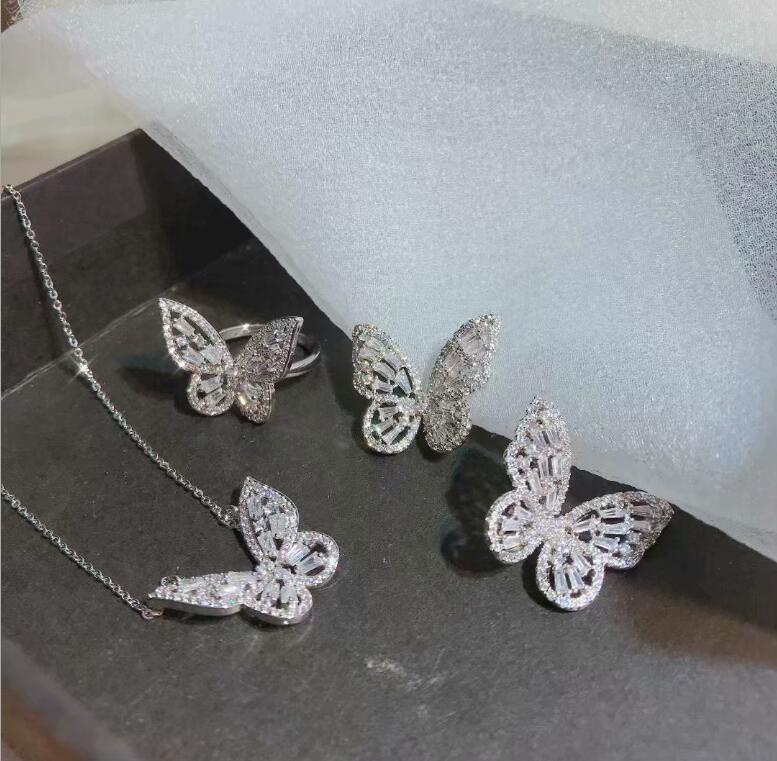 Femmes de luxe à la brillant strass boucle d'oreille gemme papillon anneau collier ensemble de bijoux