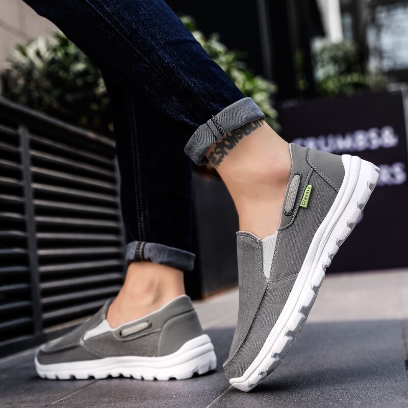 Män fritidsskor lätta loafers sneakers canvas skor bekväma herrskor stor storlek zapatos casuales manskor