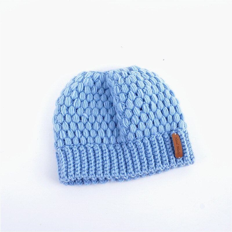 Winter gebreide mutsen winter dames muts dames meisjes stretch gebreide muts met label rommelige knot paardenstaart muts met gaten warme mutsen mutsen: Blauw