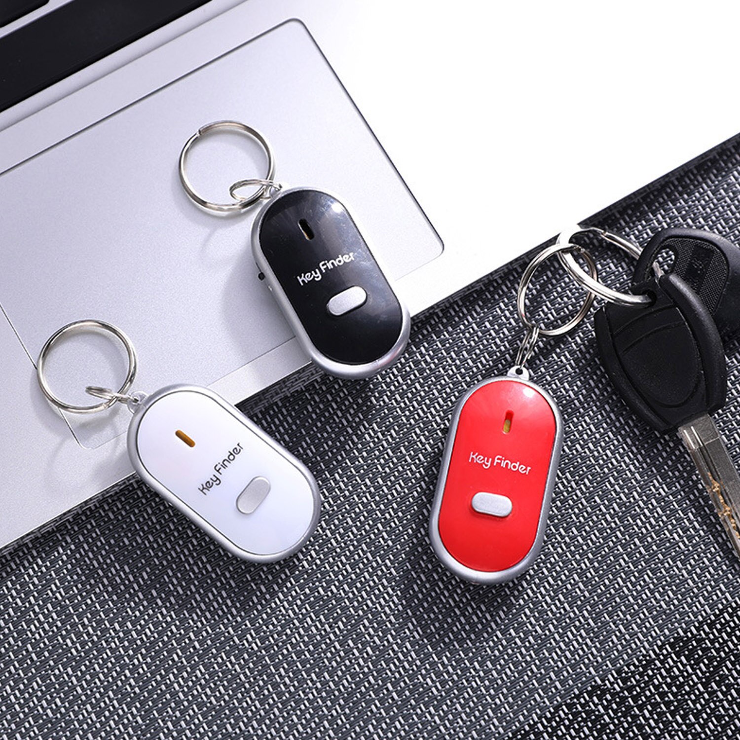 Mini anti-lost fløjtesensorer nøglefinder led lommelygte bip fjernbetjening nøglefinder locator tracker nøglering til nøgler tegnebog telefon