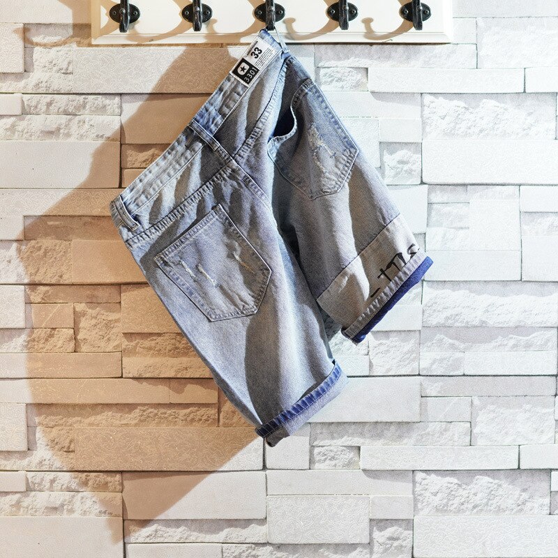 Ripped denim shorts men\'s brand summer loose Korean trend thin section Harajuku bf trousers horse short pants