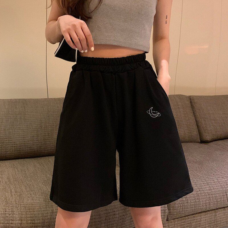 Oversize kvinder månebroderi løse shorts solide afslappet elastik talje smarte shorts koreanske vilde simple studerende underdele: Sort / M