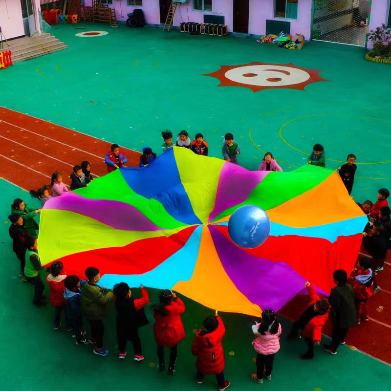 Paraguas de arcoíris para acampar al aire libre para múltiples personas, juguete de paracaídas, saco de salto, juego interactivo de trabajo en equipo, juguete para niños Gif