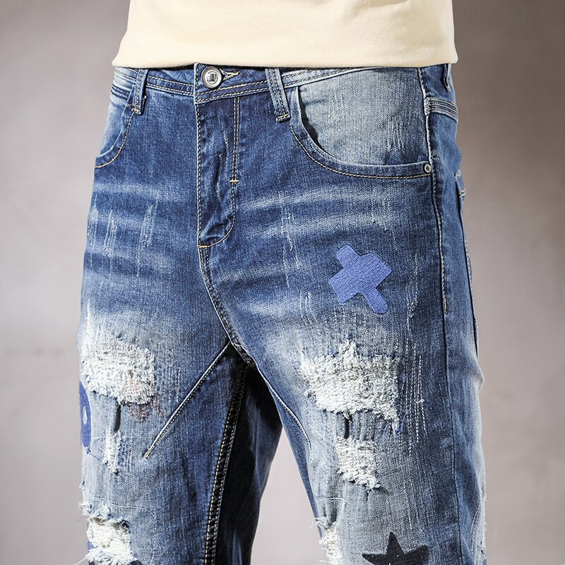 Moto i jeansy dla motocyklistów mężczyźni szczupły dopasowanie rozciągać niebieski biodro chmiel niejednolita całość sztucznie postarzane spodnie dżinsowe z dziurami dla mężczyzn wytarte dżinsy spodnie streetwear