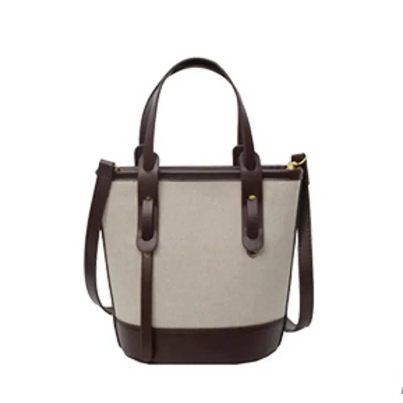 2025 polyvalent PU toile seau épaule et sacs à bandoulière Simple décontracté sens du luxe rétro sacs à main pour les femmes