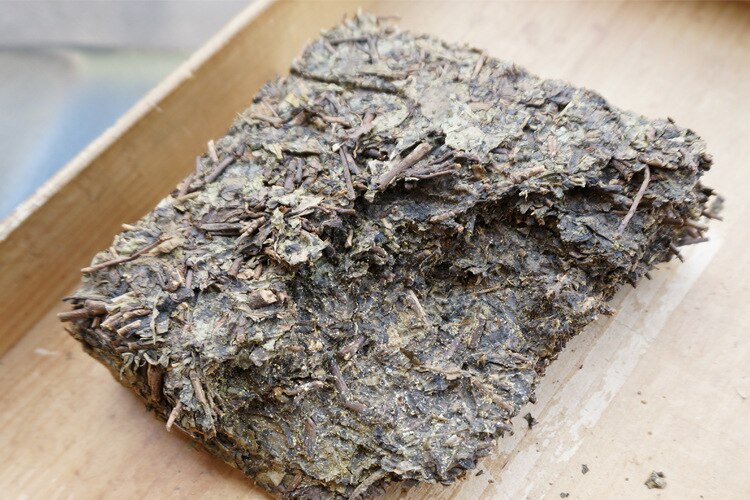 Fuzhuan-ladrillo de Fuzhuan dorado, de flor dorada de té de Fuzhuan de Xiangyi Fuzhuan, ladrillo de Fuzhuan de té negro multicolor
