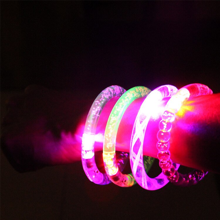 A Goods Spread Out On The Ground For Second Gram Luminescence Bracelet LED Luminescence Children Small Toys