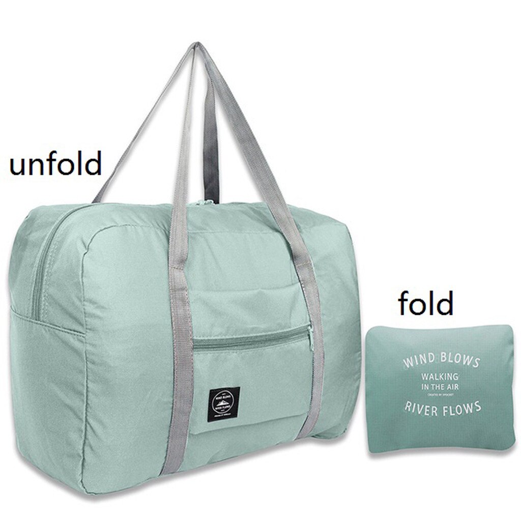 Large Capacity Overnight Travel Bag Travel Carry on Luggage Weekend Bag For Man Women Nylon Folding Waterproof Oversized Bag: Light blue