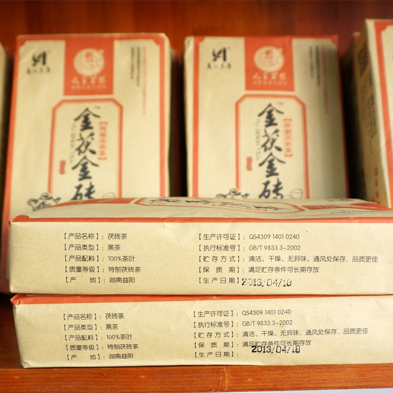 Fuzhuan-ladrillo de Fuzhuan dorado, de flor dorada de té de Fuzhuan de Xiangyi Fuzhuan, ladrillo de Fuzhuan de té negro multicolor