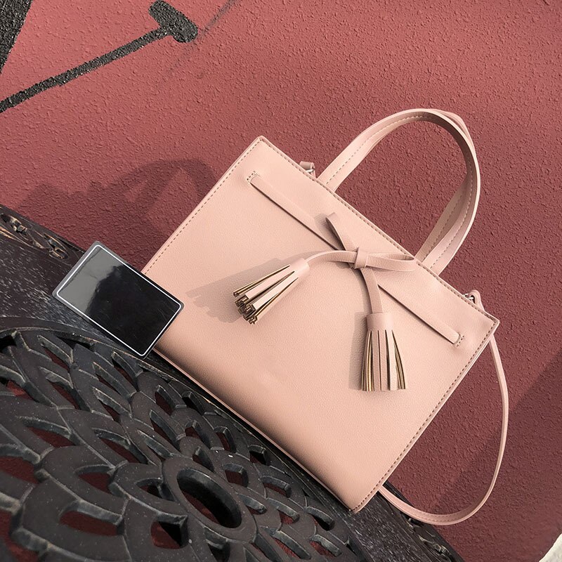 Gaohe europeu e americano bolsa de comércio exterior bolsa feminina outono e inverno nova fronteira bolsa borla arco pequeno quadrado ba: Pink.