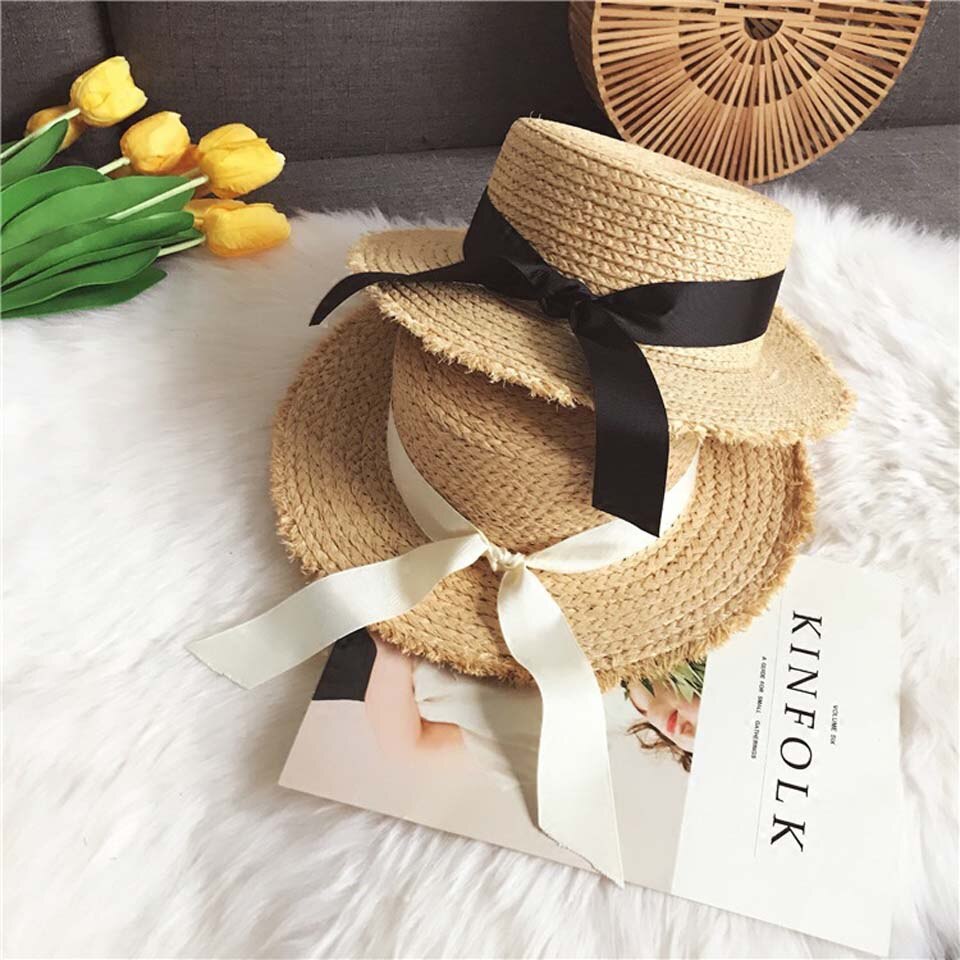 Kvinnor sommar strand raffia solhatt med band rosett raffiahatt temperament platta stråhattar dam båtägare solhatt raffia solhatt