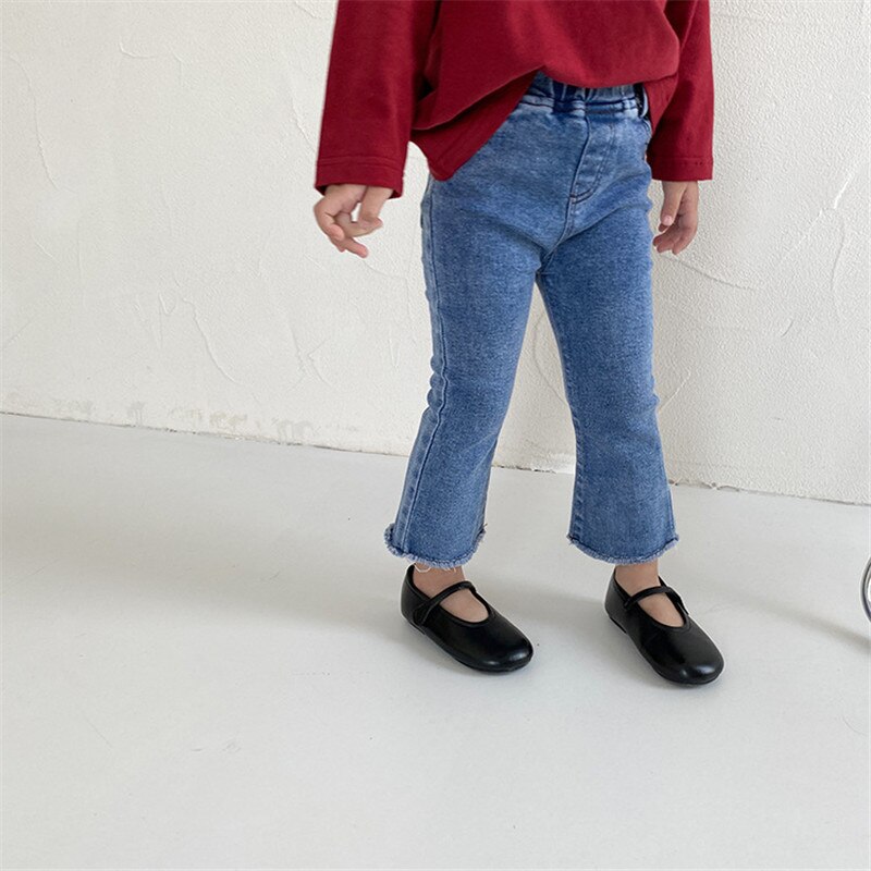 Herfst schattige meisjes elastische franjes uitlopende broek 1-7 jaar kinderen effen kleur denim broek meisje katoenen casual all-match jeans