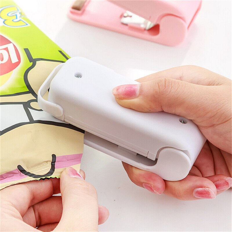 Zlinkj lyserød mini forseglingsmaskine forsegler madbesparende plast magisk forseglingspose taske håndtryk uden batteri