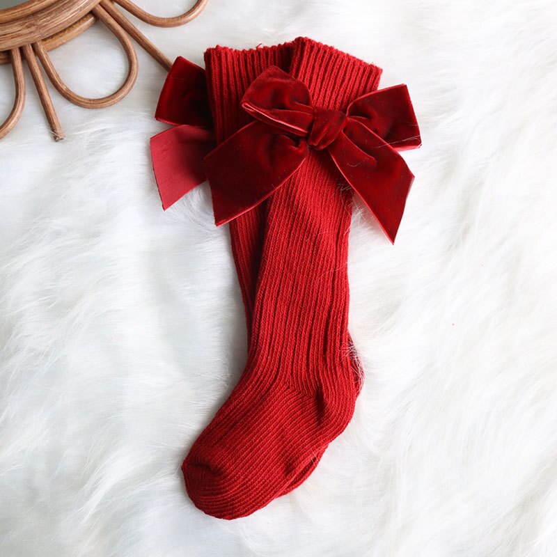 Calzini natalizi per bambina calzini per bambini in cotone con fiocco grande calzino alto scaldamuscoli in lana solida calzini lunghi morbidi per bambini