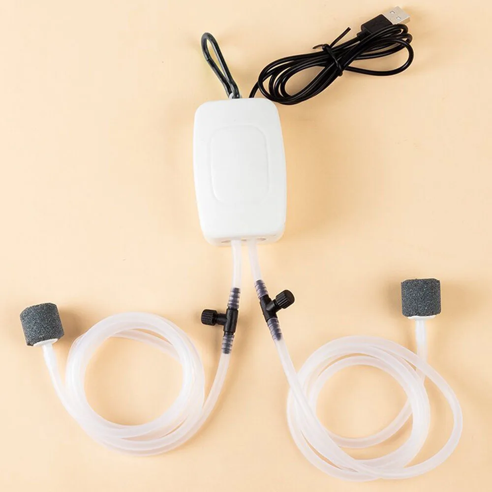 Akvaarion happipumppu akvaario usb hiljainen ilmakompressori ilmastin kannettava mini pieni hapetin akvaariotarvikesarja: Vaaleanpunainen