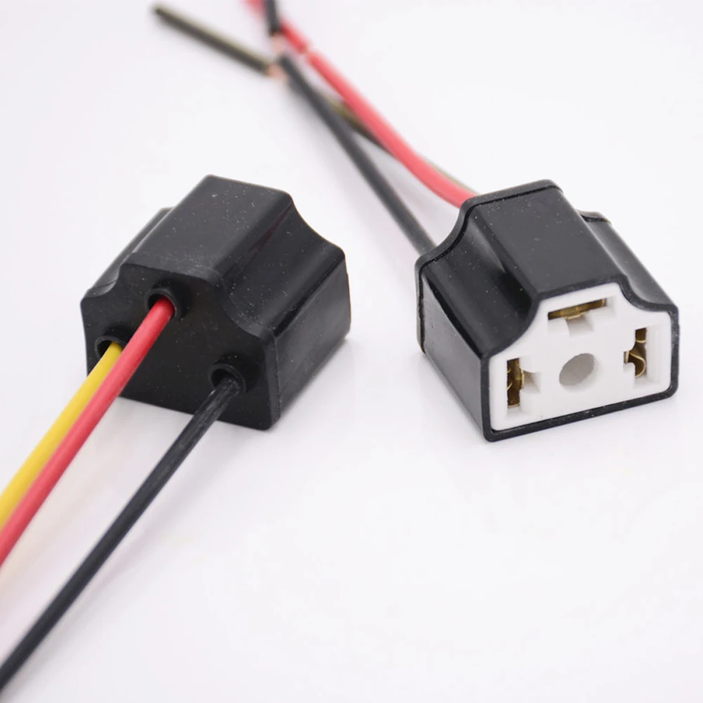 Adaptador de enchufe de Base de bombilla H4 para coche, portalámparas de cerámica Universal H4, arnés de cableado, Base de bombilla de faro, enchufe de haz de luz, 2 uds.