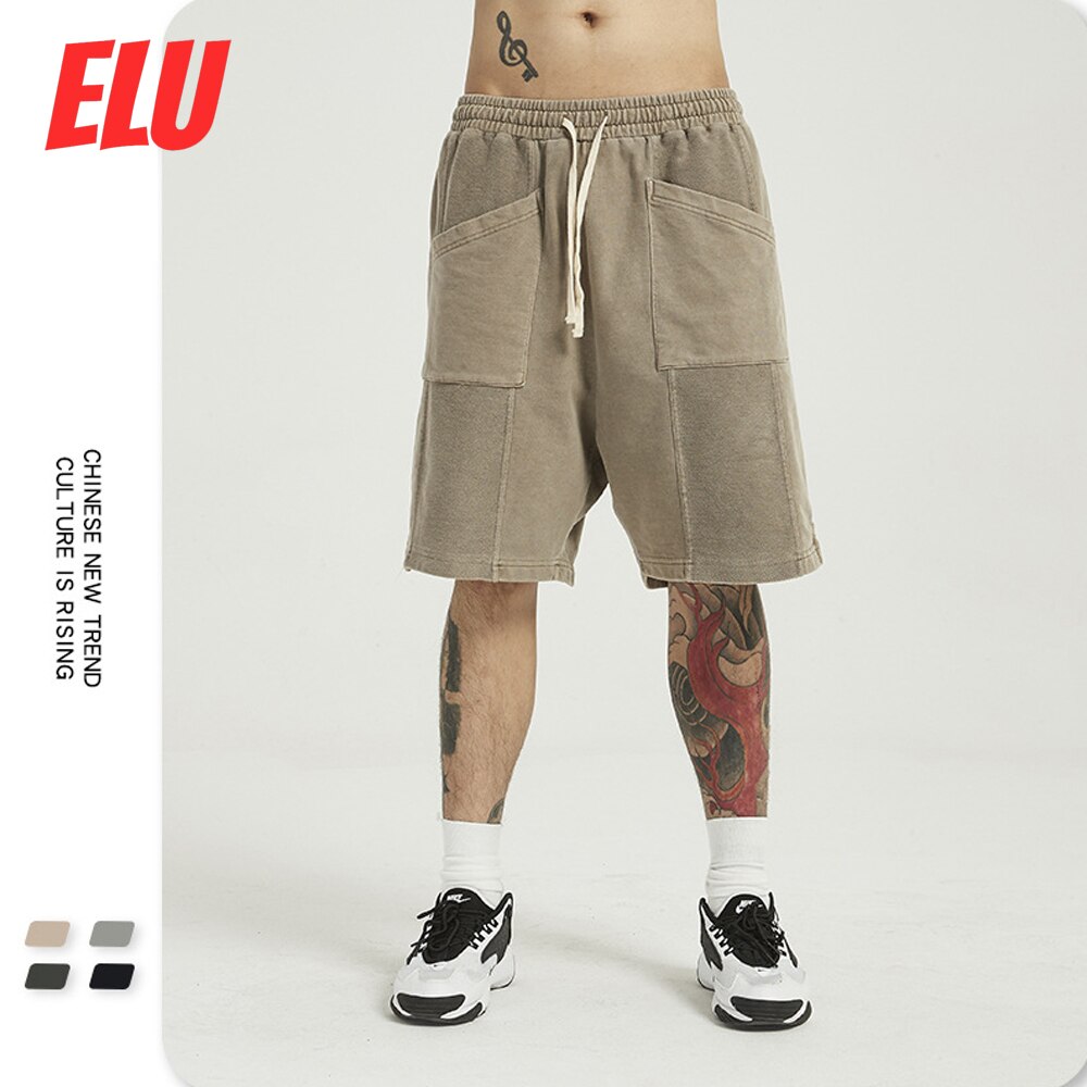 Miesten löysät hip hop sportwear -shortsit, joissa on taskut