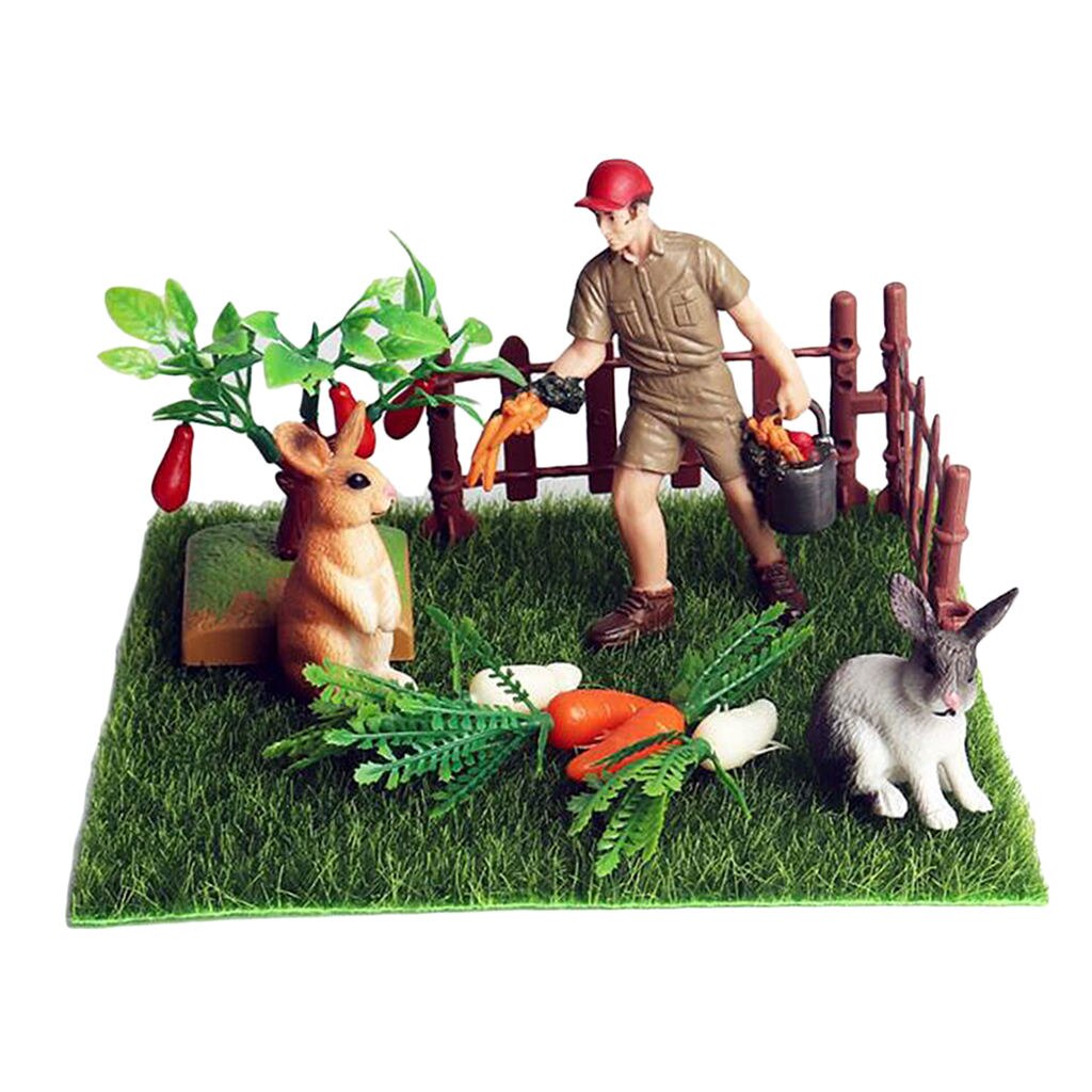 Miniatur-mikrolandschaftsdekoration mit kaninchen und karotten (nahaufnahme)