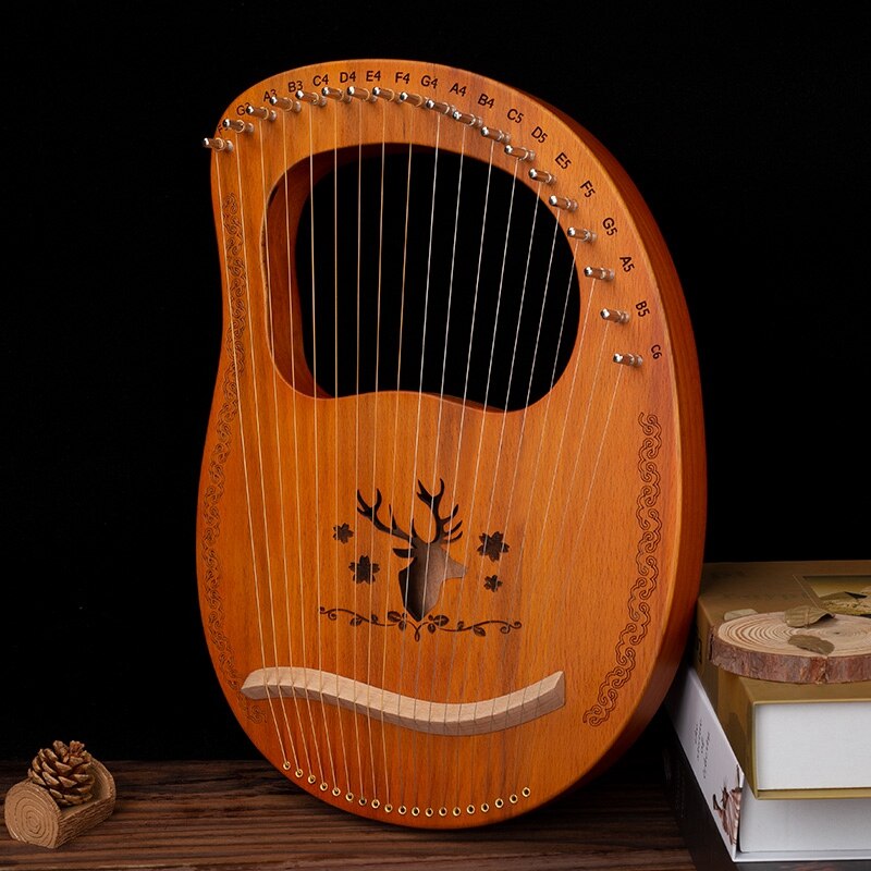 19 leierharfe aus mahagoniholz, musikinstrument mit stimmschlüssel und ersatzsaiten