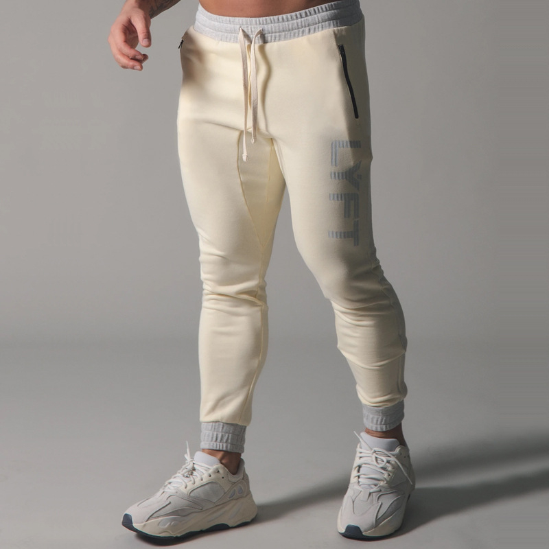 Miesten verkkarit, fitness-, kehonrakennus- ja vapaa-ajan housut, printtihousut, collegehousut, puuvillaiset verkkarit, kapea istuvuus, streetwear-housut